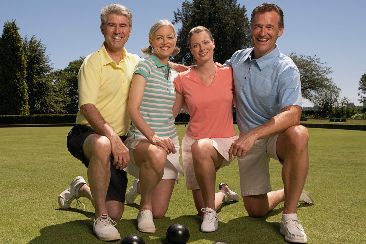 Lawn bowling group smiling